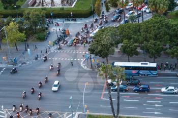 above view of car traffic on crossroad of Avinguda Diagonal in Barcelona city in evening