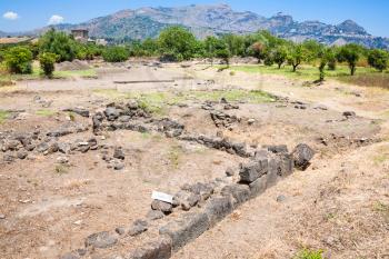 travel to Italy - ruins in Naxos Archaeological Park in Giardini Naxos town in Sicily
