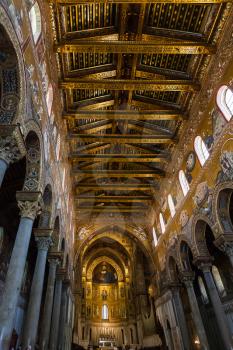 MONREALE, ITALY - JUNE 25, 2011: ceiling of Duomo di Monreale in Sicily. The cathedral of Monreale is one of the greatest examples of Norman architecture, it was begun in 1174