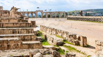 Travel to Middle East country Kingdom of Jordan - arena of circus hippodrome in Jerash (ancient Gerasa) town