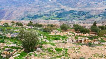 Travel to Middle East country Kingdom of Jordan - view of gardens from Mount Nebo in winter