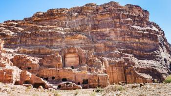 Travel to Middle East country Kingdom of Jordan - ancient tombs, temples and houses on Street of Facades in Petra town in winter