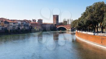 travel to Italy - view of Adige river with Castelvecchio (Scaliger) Bridge and Castel in Verona city in spring
