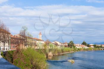 travel to Italy - cityscape with waterfront of Adige river in Verona city in spring