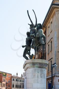 travel to Italy - outdoor bronze sculpture on Ponte della Vittoria (by Mario Salazzari, 1929) in Verona city in spring