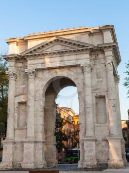 travel to Italy - view of Arco dei Gavi in Verona city in spring evening