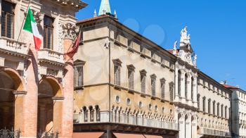 travel to Italy - facades of palazzo Palazzo del Capitaniato ( loggia bernarda), palazzo del monte di pieta and chiesa di san vincenzo on Piazza dei Signori in Vicenza city in Vicenza city in spring