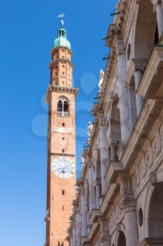 travel to Italy - clock tower (torre della bissara) of Basilica Palladiana in Vicenza city in spring
