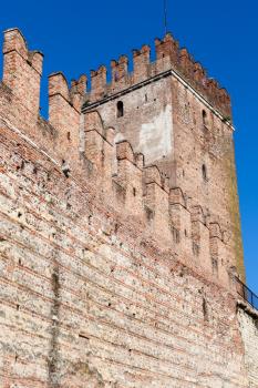 travel to Italy - wall and tower of Castelvecchio (Scaliger) Castel in Verona city in sunny spring day