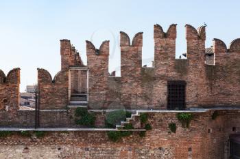 travel to Italy - m-shaped merlons on walls of Castelvecchio (Scaliger) Castel in Verona city in spring