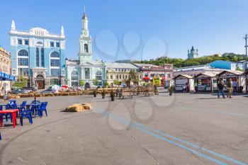 KIEV, UKRAINE - MAY 5, 2017: people and outdoor market on Kontraktova Square in Kiev city in spring. Contract Square is central square in the historic Podil neighborhood of Kiev