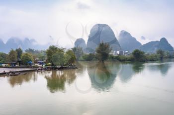 travel to China - view of surface Yulong and Jinbao rivers and karst peaks in Yangshuo County in spring season