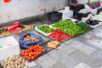 travel to China - fresh local garden vegetables on street outdoor market in Yangshuo town in spring in spring season