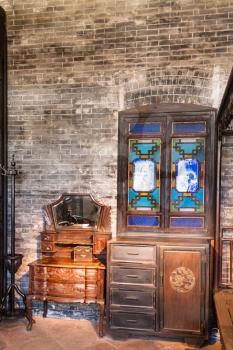 GUANGZHOU, CHINA - MARCH 31, 2017: furniture in interior of Chen Clan Ancestral Hall (Guangdong Folk Art Museum) in Guangzhou city. The house was prepared for imperial examinations in 1894