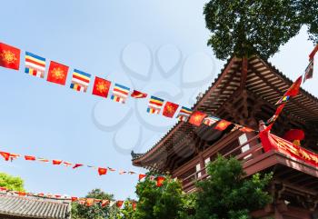 GUANGZHOU, CHINA - APRIL 1, 2017: flag garlands in Guangxiao Temple (Bright Obedience, Bright Filial Piety Temple). This is is one of the oldest Buddhist temples in Guangzhou city