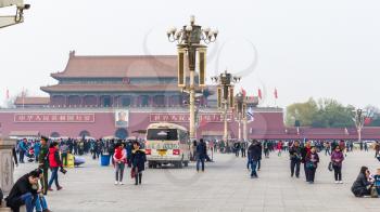 BEIJING, CHINA - MARCH 19, 2017: visitors and view The Tiananmen monument (Gate of Heavenly Peace) on Tiananmen Square in spring. Tiananmen Square is central city square in Beijing