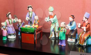 GUANGZHOU, CHINA - MARCH 31, 2017: Porcelain sculptures in Chen Clan Ancestral Hall (Guangdong Folk Art Museum) in Guangzhou city. The house was prepared for imperial examinations in 1894