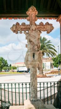 Travel to Algarve Portugal - The Cruz de Portugal (Cross of Portugal) on square. It is monument in Silves city classified as a National Monument since 1910