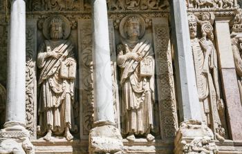 Travel to Provence, France - outdoor wall sculptures of ancient Church of St. Trophime in Arles city