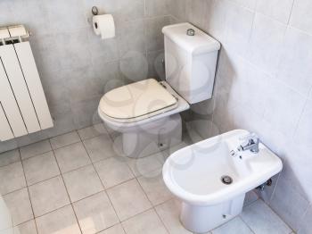 interior of simple white modern toilet room