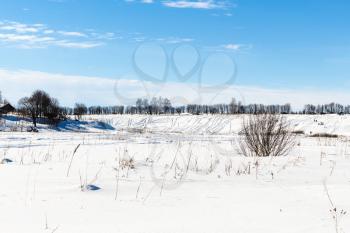 snowy landscape with frozen river in Suzdal town in winter in Vladimir oblast of Russia