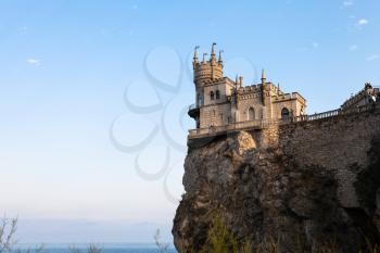 travel to Crimea - Swallow Nest Castle on Aurora Cliff in Gaspra District on Crimean South Coast of Black Sea in evening