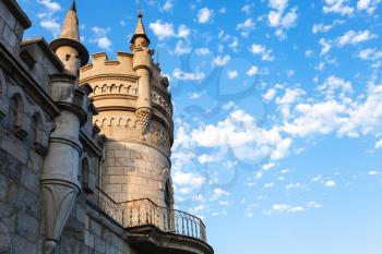 travel to Crimea - tower of Swallow Nest Castle and blue sky in Gaspra District on Crimean Southern Coast in autumn evening
