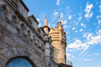 travel to Crimea - wall and tower of Swallow Nest Castle and blue sky in Gaspra District on Crimean Southern Coast in autumn evening