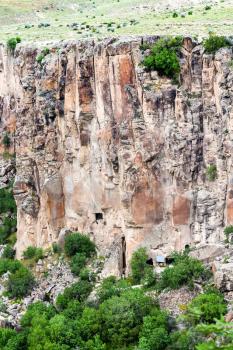 Travel to Turkey - rocky slope of Ihlara Valley of Aksaray Province in Cappadocia in spring