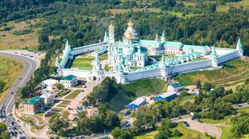 above view of New Jerusalem (Novoiyerusalimsky, Voskresensky Resurrection) Monastery in green hills near Istra town in Moscow Region in summer day