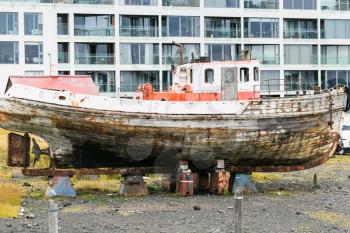 travel to Iceland - old boat on street in Reykjavik city in september