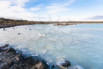 travel to Iceland - Blue Lagoon Geothermal lake in Grindavik lava field outside spa resort in september evening