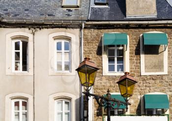 travel to France - facades of urban houses in Boulogne-sur-Mer city on square Place Godefroy de Bouillon in summer day