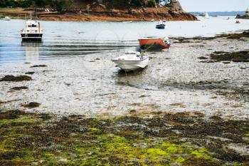 travel to France - boats in Port-Clos harbour of Ile-de-Brehat island in Cotes-d'Armor department of Brittany in during low tide in summer