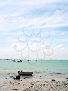 travel to France - boats on beach of Port de la Houle of English Channel in Cancale town in Brittany in summer day