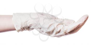 side view of empty handful in palm in latex glove isolated on white background