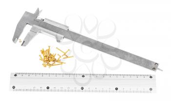 old steel callipers, metallic ruler and lot of brass screws isolated on white background