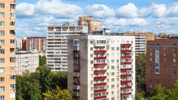 panoramic view of residential district with high-rise houses in Moscow city in sunny summer day