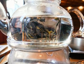 hydrangea root tea in glass teapot in local cafe in Seoul city (snapshot by mobile smartphone)