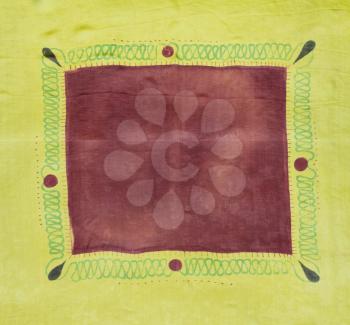 textile background - abstract hand painted yellow-brown silk scarf