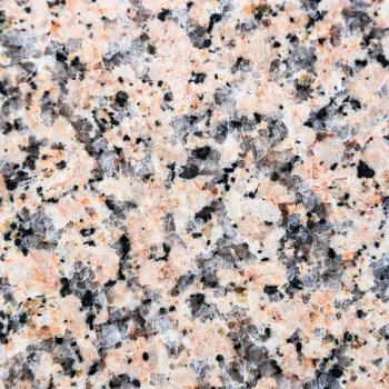 square background from polished slab of natural pink granite