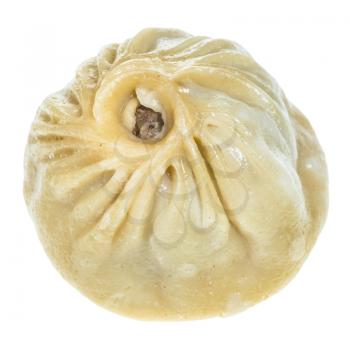 single steamed Mongolian dumpling Buuz filled with minced beef meat isolated on white background