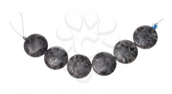 string of beads from natural polished labradorite gemstone isolated on white background