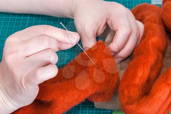 master class of repairing fleece glove using Needle felting process - craftsman repairs felted glove with felting needle