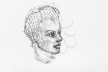 sketch of teenager's head with narrow face and hair brushed up hand-drawn by black pencil on white paper