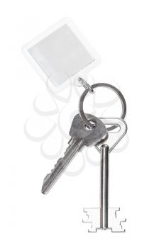 two door keys on keyring with blank keychain isolated on white background
