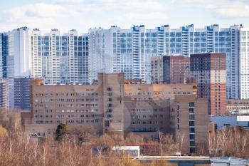 large high-rise apartment houses in Moscow city on sunny March day