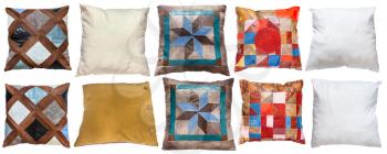 collection of various handmade pillows isolated on white background