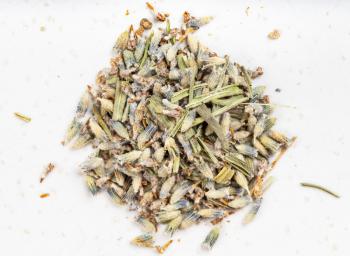 top view of pile of old dried lavender close up on gray ceramic plate
