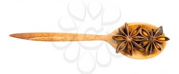 top view of wood spoon with star anise (badian) isolated on white background